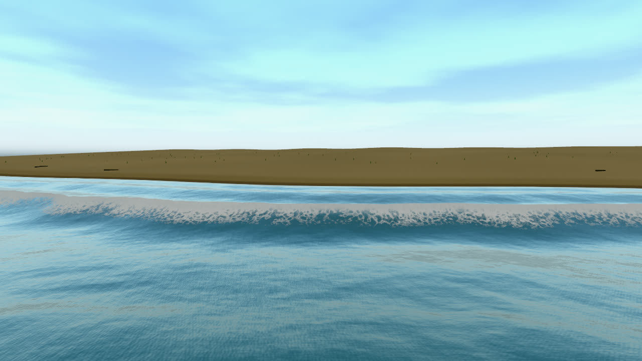 Breaking waves rolling onto a sand beach